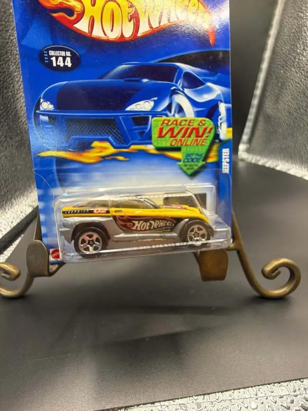 2002 Hot Wheels Jeepster Collector No. 144 Yellow Die-Cast Car
